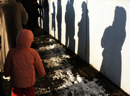 People standing in row. Urban backgroundの写真素材