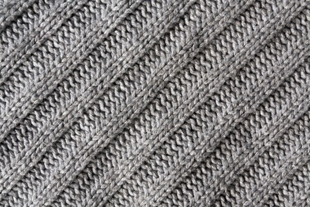 Abstract grey knitted cloth texture. Background and texture for design.