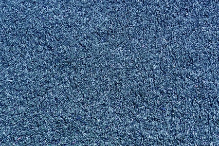 Decorative blue grass loan texture. Sport and leisure. Abstract background and texture for designの写真素材