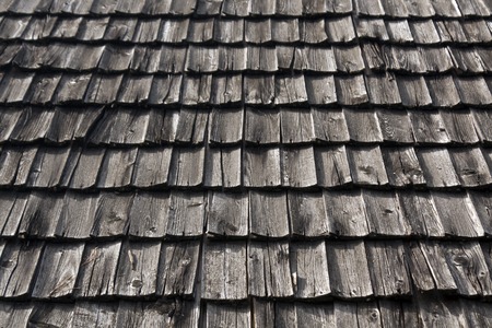 Weathered wooden tile roof texture. Abstract background and texture for design.の写真素材