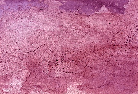 Grungy pink color cement wall surface. Abstract background for design.の写真素材