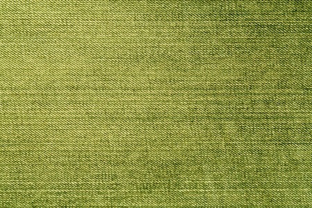 Yellow color denim close up. Abstract background and texture for design.の写真素材