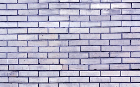 Blue toned brick wall texture. Architectural background and texture.