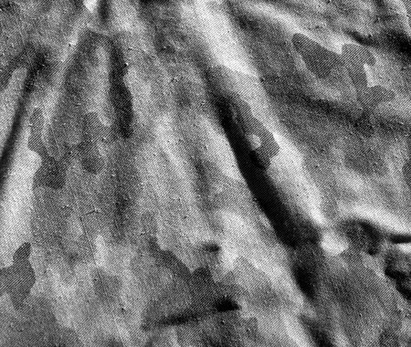 Dirty old black and white camouflage cloth pattern. Abstract background and texture for designの写真素材