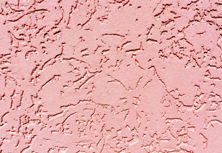Red color plaster wall pattern. Abstract background and texture for design.の写真素材