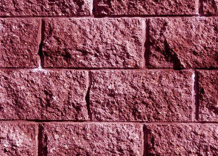 Pink color stylized brick wall pattern. Abstract background and texture for design.の写真素材