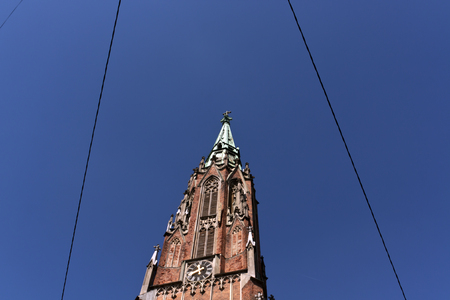 Old church in Riga and electric wires. Tourist viewの写真素材