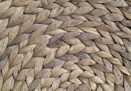 Natural color round straw mat texture. Abstract background and texture for designの写真素材