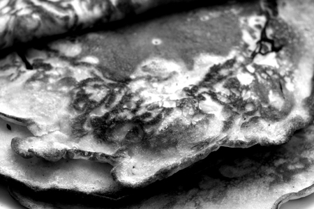 Plate with pancakes in black and white. Food and ingredientes.
