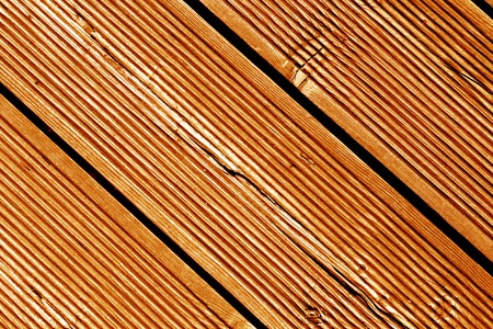Wooden floor pattern in orange tone. Abstract background and texture for design.の写真素材
