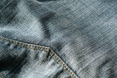 Jeans with pocket with blur effect. Abstract background and texture for design.