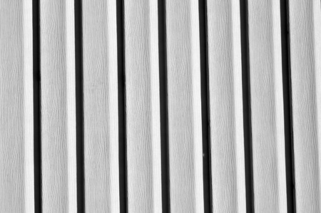 Plastic siding wall texture in black and white. Abstract background and texture for design.の写真素材