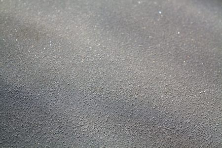 Frost and snow with blur effect on sun. Seasonal background and texture.の写真素材