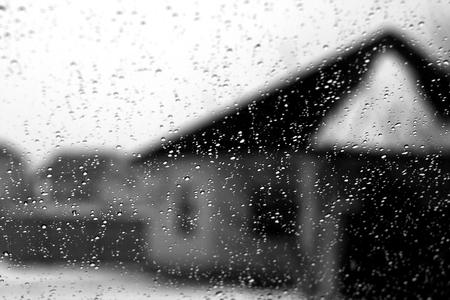 Blurred view through car window on winter season in black and white. Seasonal background texture for design.の写真素材