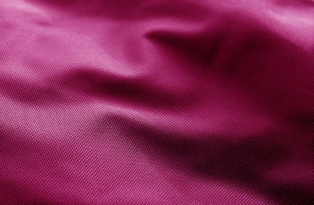 Textile texture with blur effect in pink color. Abstract background and texture for design.の写真素材