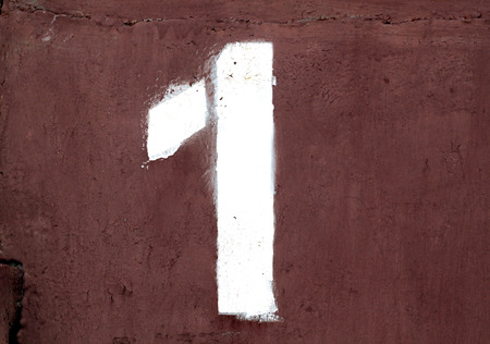 Number 1 in stencil on metal wall. Abstract background and texture for design.の写真素材