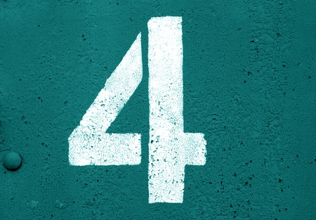 Number 4 in stencil on metal wall in cyan tone. Abstract background and texture for design.