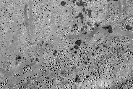 Wet plastic transparent old wrap texture in black and white. Abstract background and texture for...