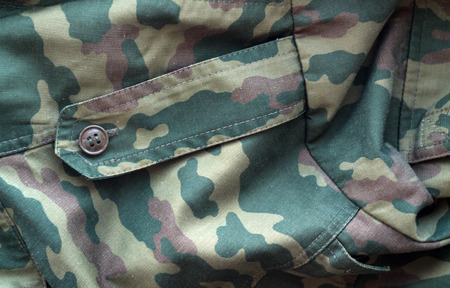Military uniform pattern with blur effect. Abstract background and texture.