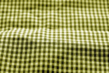 Checked fabric texture in blur effect in yellow tone. Abstract background and texture for design.の写真素材