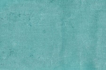 Old grungy canvas pattern with dirty spots in cyan color. Abstract background, texture, surface for any design.の写真素材