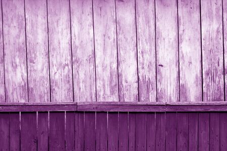 Old grunge wooden fence and wooden wall pattern in purple tone. Abstract background and texture for design.の写真素材