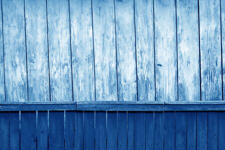Old grunge wooden fence and wooden wall pattern in navy blue tone. Abstract background and texture for design.の写真素材
