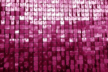 Glittering background in pink tone. Abstract background and texture for design.の写真素材
