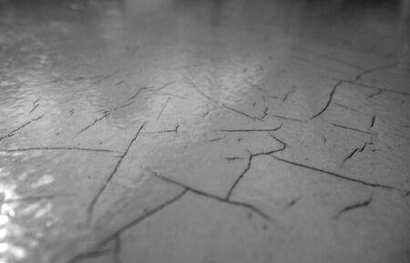 Cracked paint texture in black and white. Abstract architectural background and texture for design.の写真素材