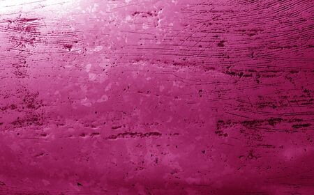 Metal rough surface in pink tone. Abstract background and texture for design.の写真素材