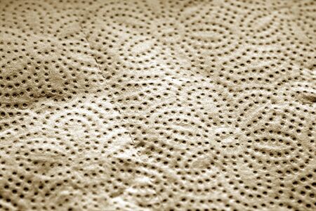 Paper towel surface with blur effect in brown tone. Abstract background and texture for design.の写真素材