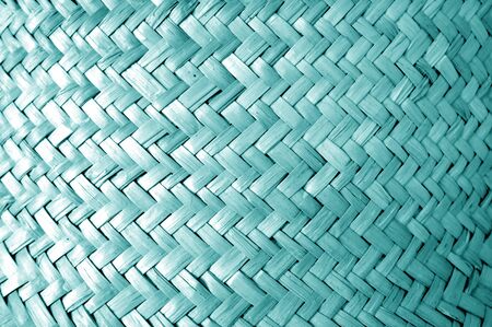 Wicker basket pattern with blur effect in cyan tone. Abstract background and texture for design.の写真素材