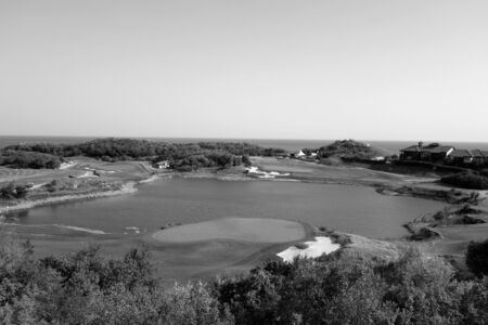 Golf fields and Black sea resort in black and white. Seasonal natural background.