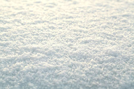 white snow close up texture with blur effect. Seasonal background and viewの写真素材