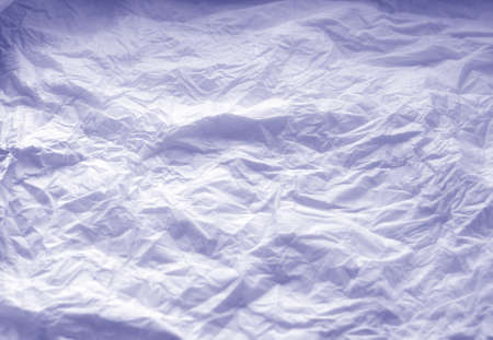 Crumpled paper background in purple tone. Abstract texture for design and ideas.の写真素材