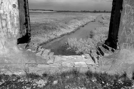 Ruins of old brick building with landscape. Landscape and view, history, Belarus.