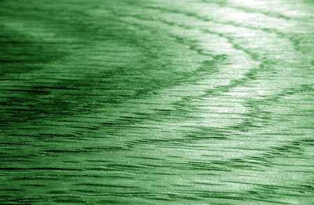 Old oak board texture as background with blur effect in green tone. Surface and natural pattern.の写真素材