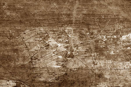 Old rusted and stained floor pattern in brown tone. Background and texture.