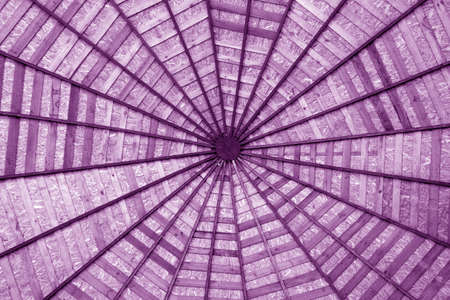 Wooden roof from bottom in purple tone. Abstract pattern and background.の写真素材