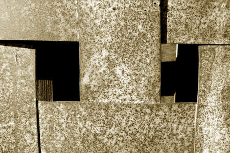 Rusty abstract metal grit construction in brown tone. Background and texture.