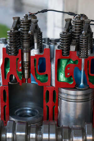 close view to the cylinders in vehicle car engine. cutaway model for education, repairingの写真素材
