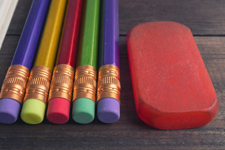 closeup view colorful pencils with red eraser. detail view low angle shotの写真素材