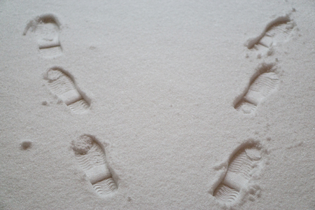 unusual footprints on a snow. walking like skier on high mountainの写真素材
