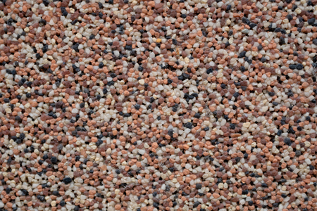 abstract background made of little tiny vivid colorful pebbles different colorsの写真素材