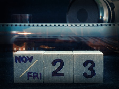black friday 23 november 2018 photo video camera film equipment deal banner. low key shot with selective focus on foreground dateの写真素材