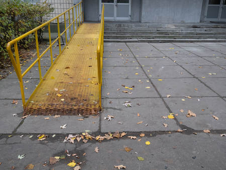 ramp for wheelchair disabled people in way to the office building. special care supporting people with Increased needsの写真素材