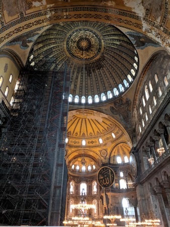 ISTANBUL, TURKEY - SEPTEMBER 25, 2018: Inside Hagia Sophia view at dome under restoration process with high scaffoldingのeditorial素材