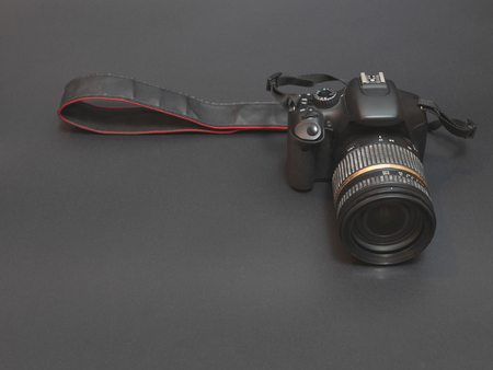 low angle shot of professional photo camera. low key image. concept of electronic photographic equipment store departmentの写真素材