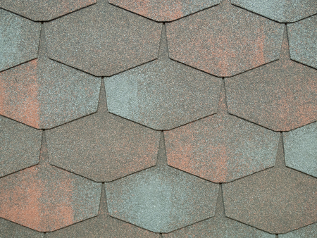 closeup of modern heaxgon roof shingles tiles. waterproof scabrous rough surface for house exterior coverの写真素材
