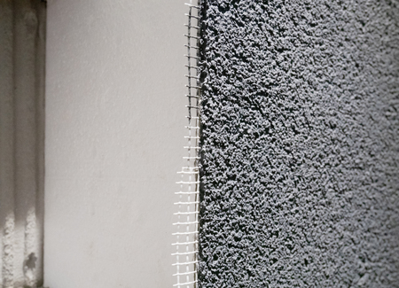 building wall cut  , plastic armored grid and waterproof stucco plasterの写真素材